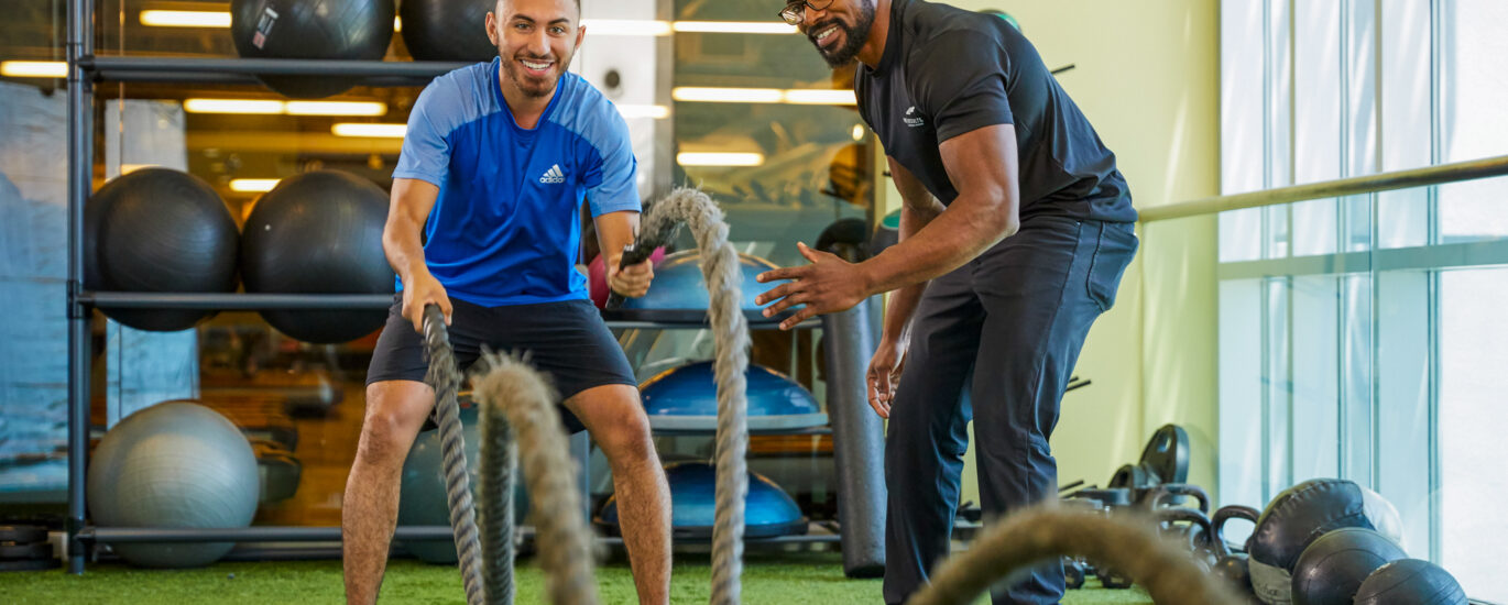 benefits of personal training coach and athlete gym